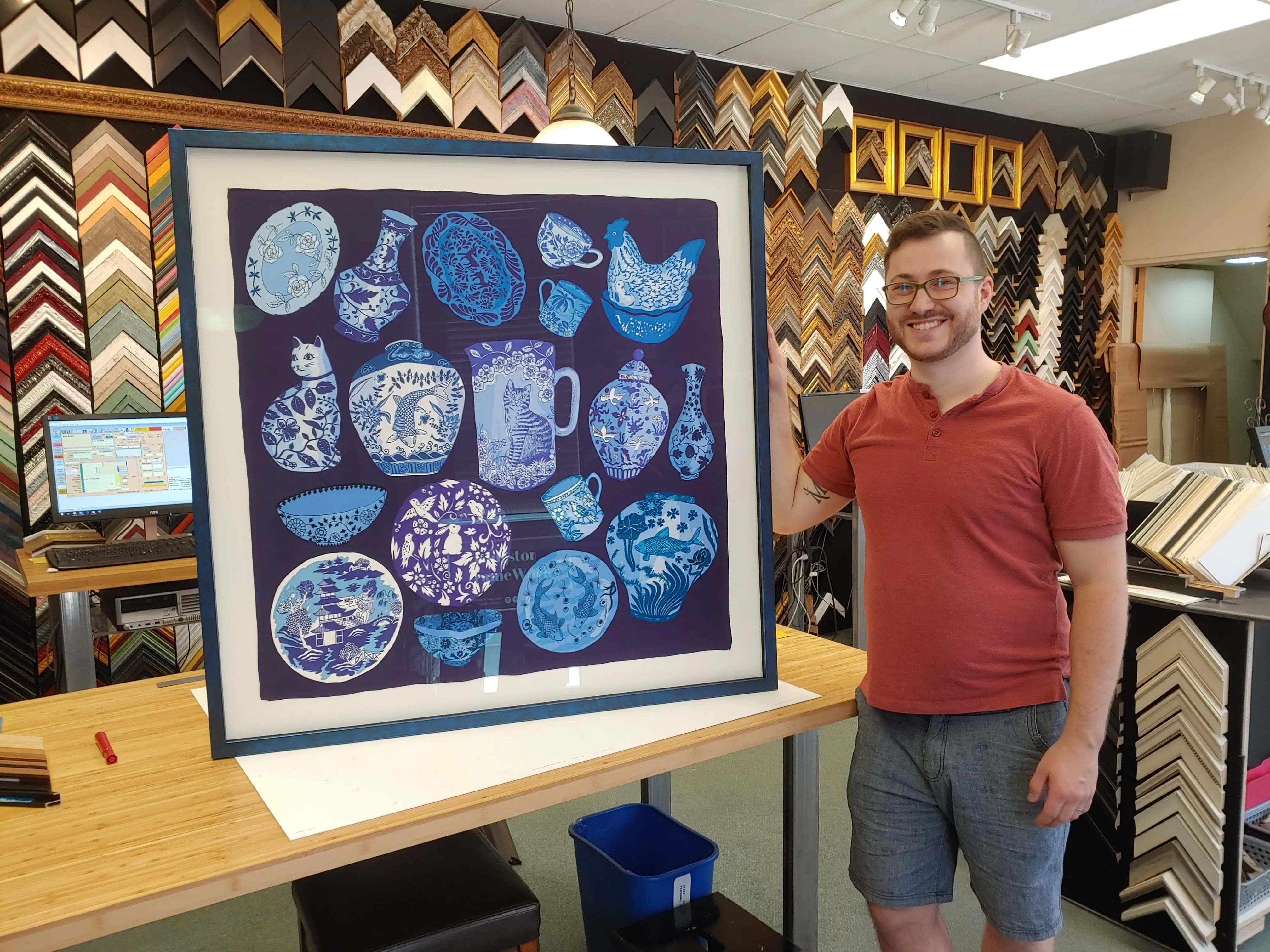 A framed mirror and corkboard adding a decorative touch to a cozy space.