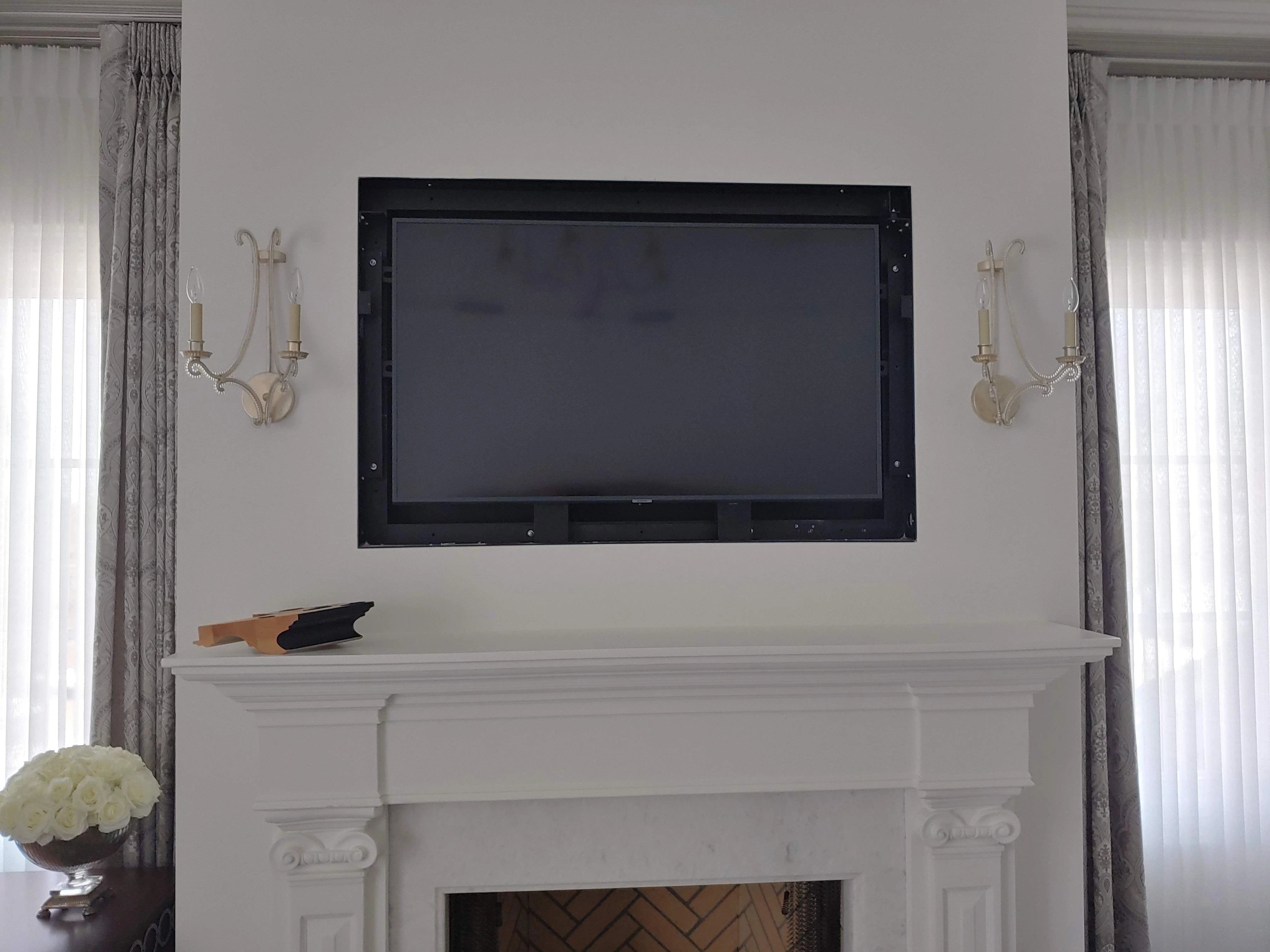 Custom Frame for Art Mode TV in a Bedroom - A TV with a custom frame displaying Art Mode, seamlessly integrated into a stylish bedroom.