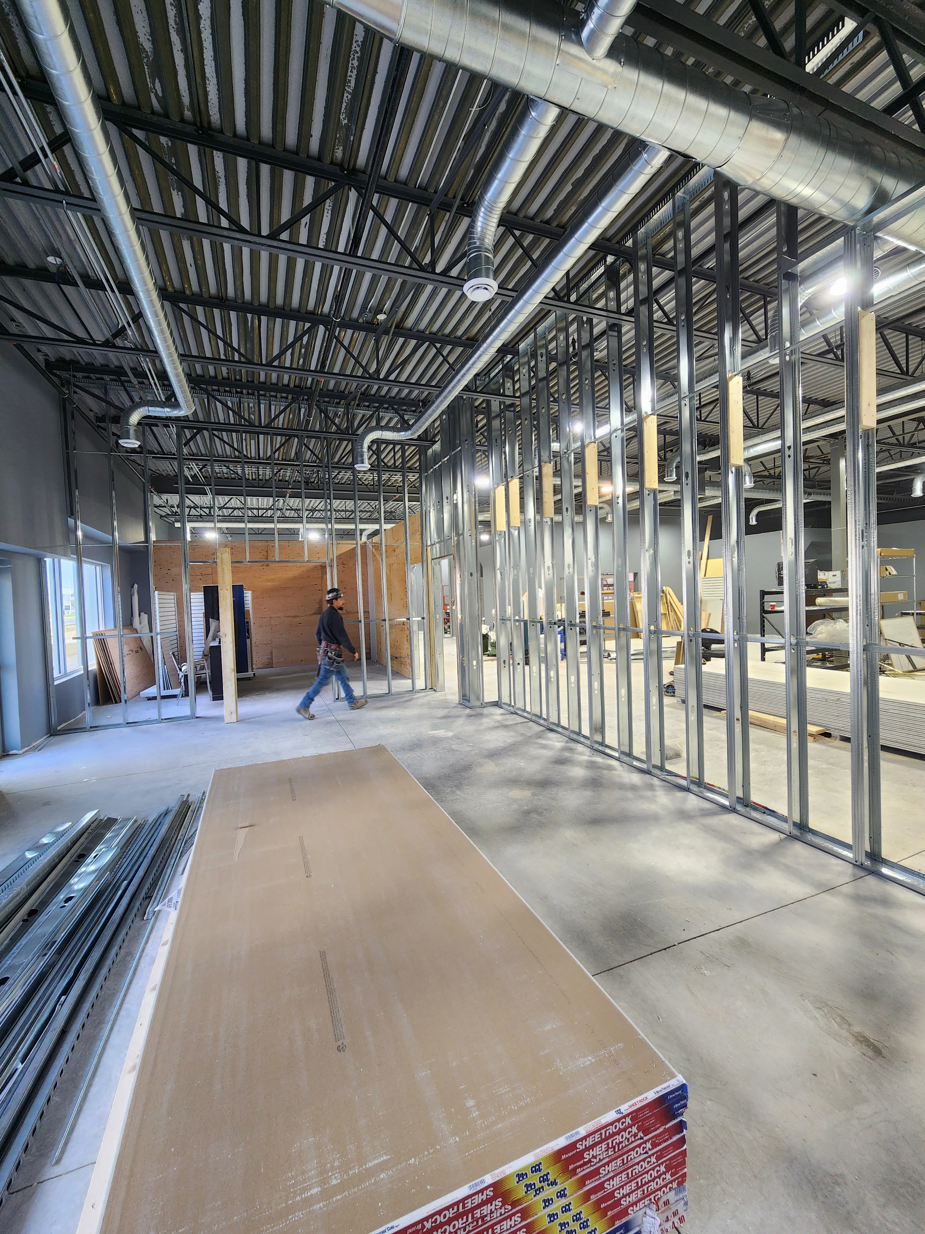 Customers waiting in line for custom framing at Kingston Frameworks in 1982