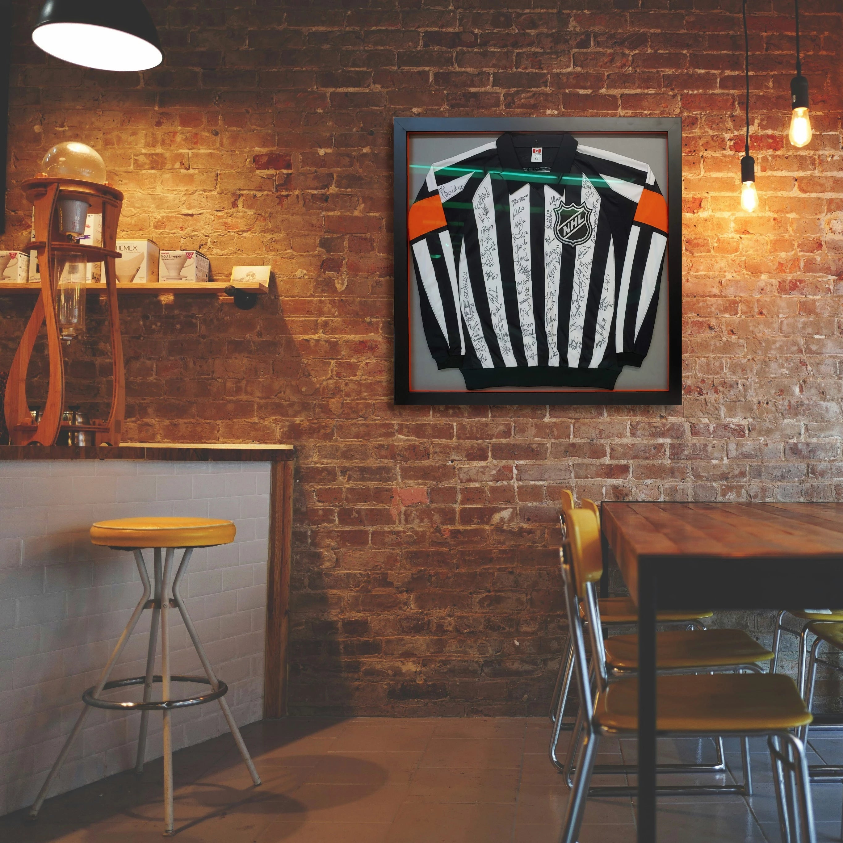 Custom hockey jersey frame with UV-protective glass, ready to hang