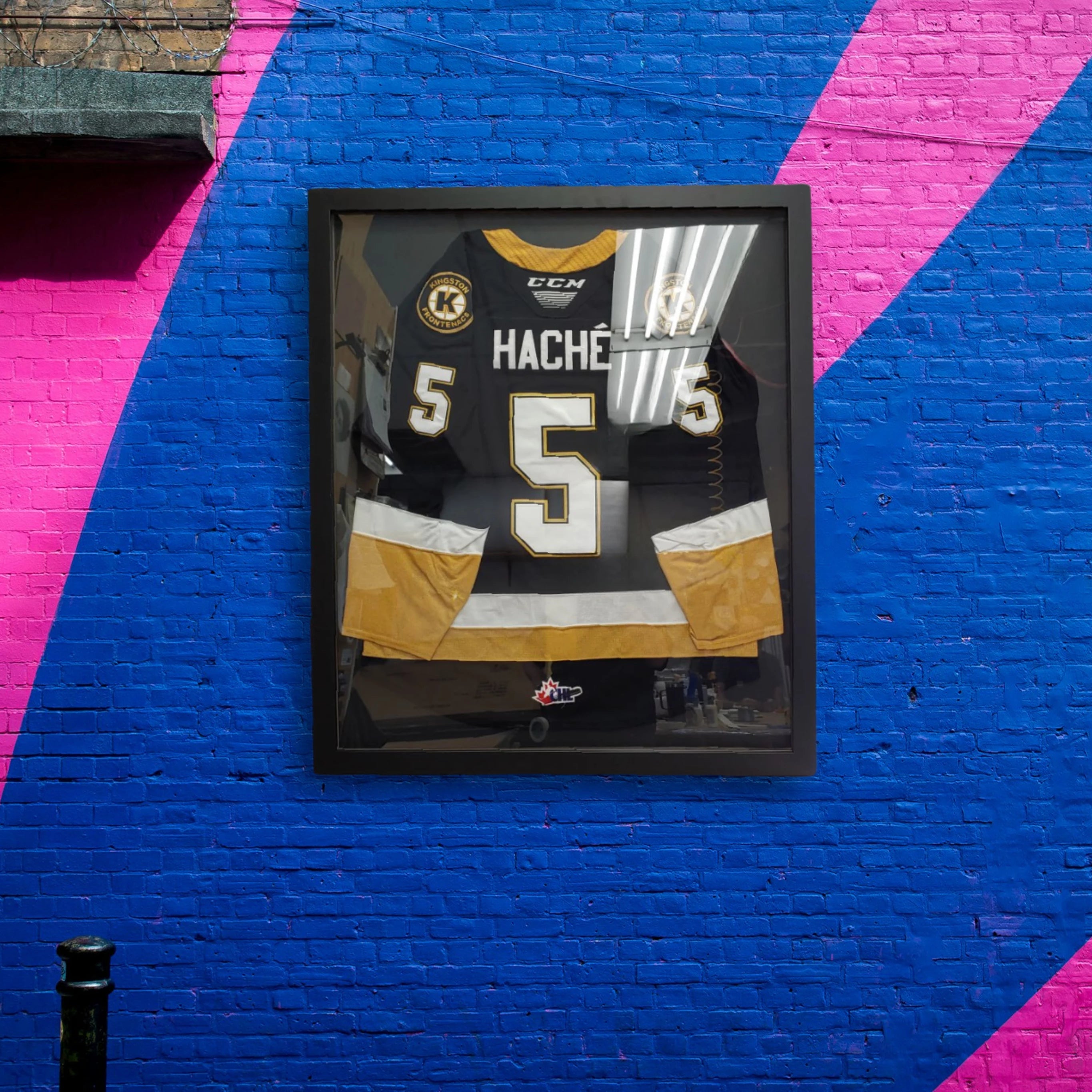 Team jersey shadowbox with double mat in green and gold